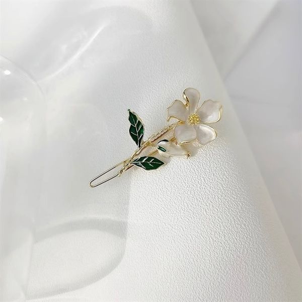  Kẹp tóc cành hoa trắng 