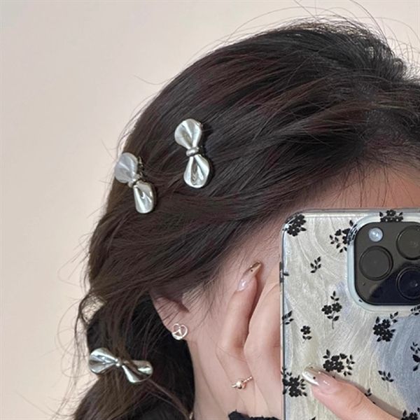  Kẹp tóc nơ bạc mini 