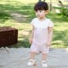 Bộ ngắn tay cài lệch Nơ ngực - KVS130711