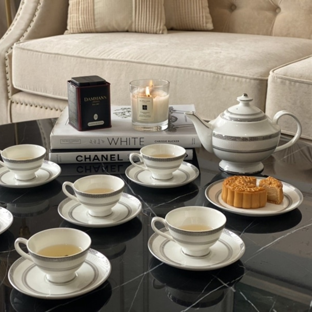 Bộ trà sứ xương Bạch Kim Anh viền bạc