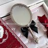 Bản nội địa STRAWBERRY CUPID - Gương cầm tay Flower Knows CUPID kích thước 22 x 9.8 cm