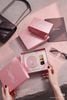 Set YSL VÂN HỒNG 4 món gồm: 1 Cushion YSL vỏ vân hồng tone B10 + 1 Son thỏi YSL mini màu NM + 1 box giấy + 1 túi giấy
