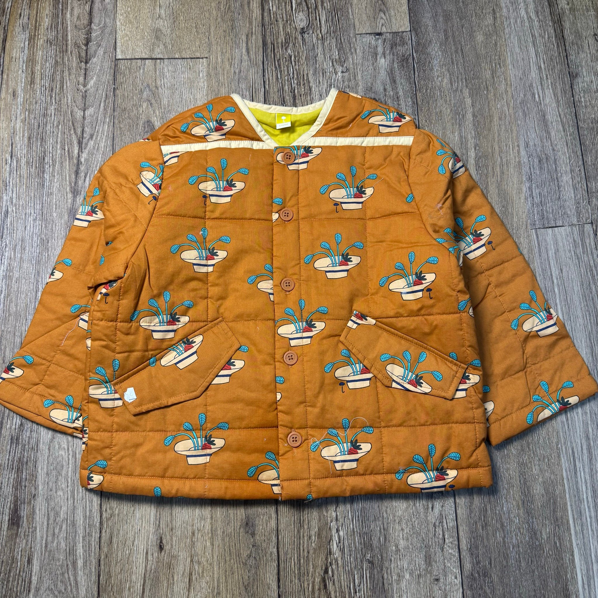 Áo khoác chần bông Moimoln nâu hoạ tiết cho bé size 90/120