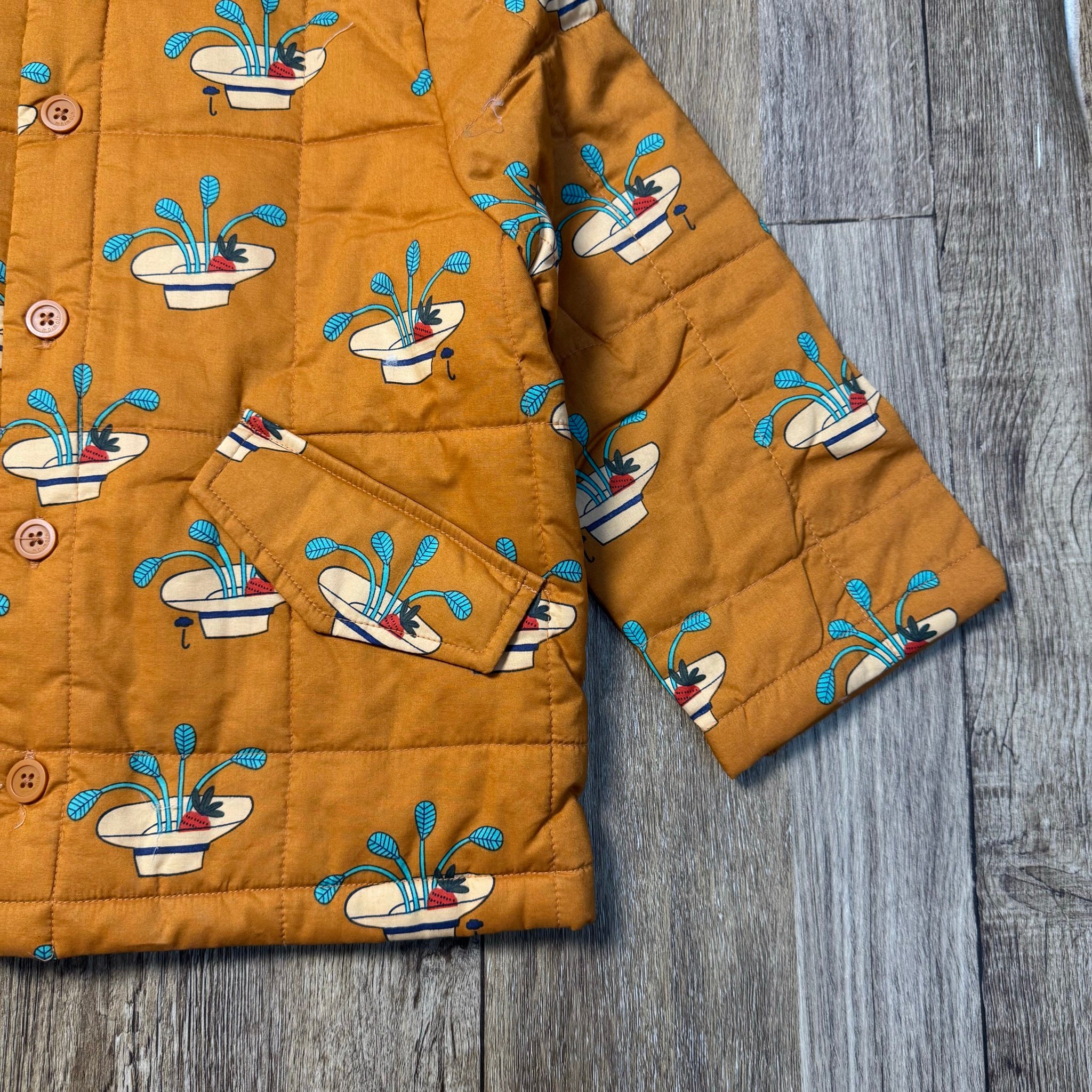 Áo khoác chần bông Moimoln nâu hoạ tiết cho bé size 90/120