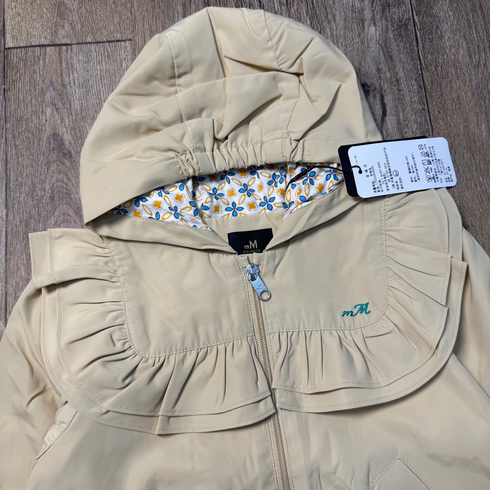 Áo khoác gió Moimoln 2 lớp lót cotton màu be viền bèo cho bé gái size 100-140