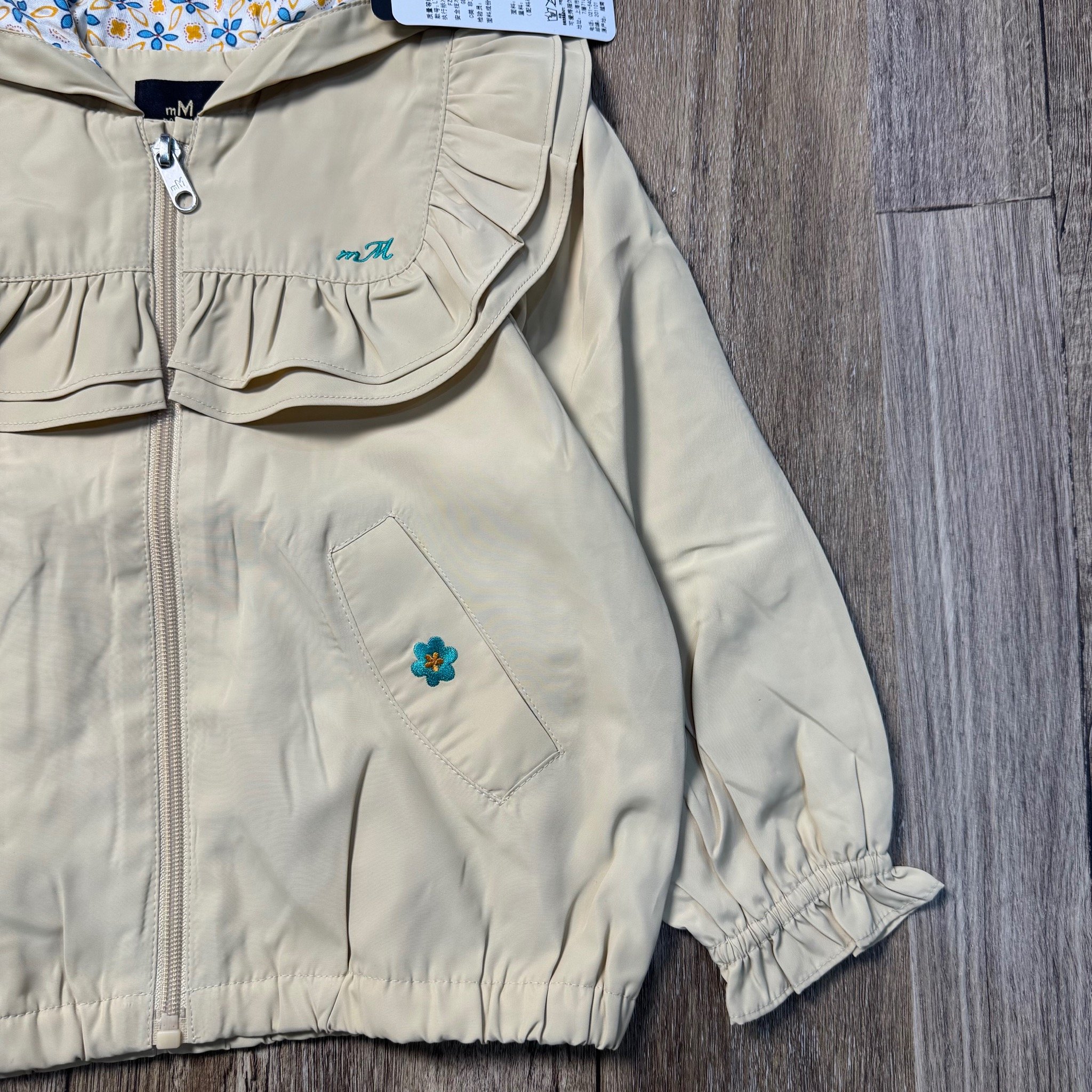 Áo khoác gió Moimoln 2 lớp lót cotton màu be viền bèo cho bé gái size 100-140