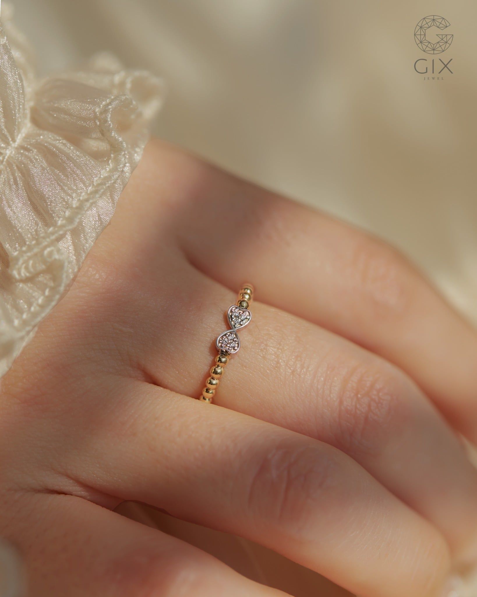  Nhẫn vàng 14K nữ đai bi tròn hình nơ xinh | Gix Jewel 
