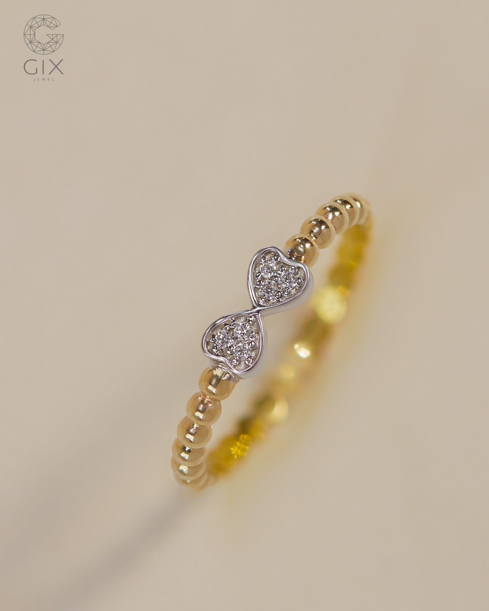  Nhẫn vàng 14K nữ đai bi tròn hình nơ xinh | Gix Jewel 