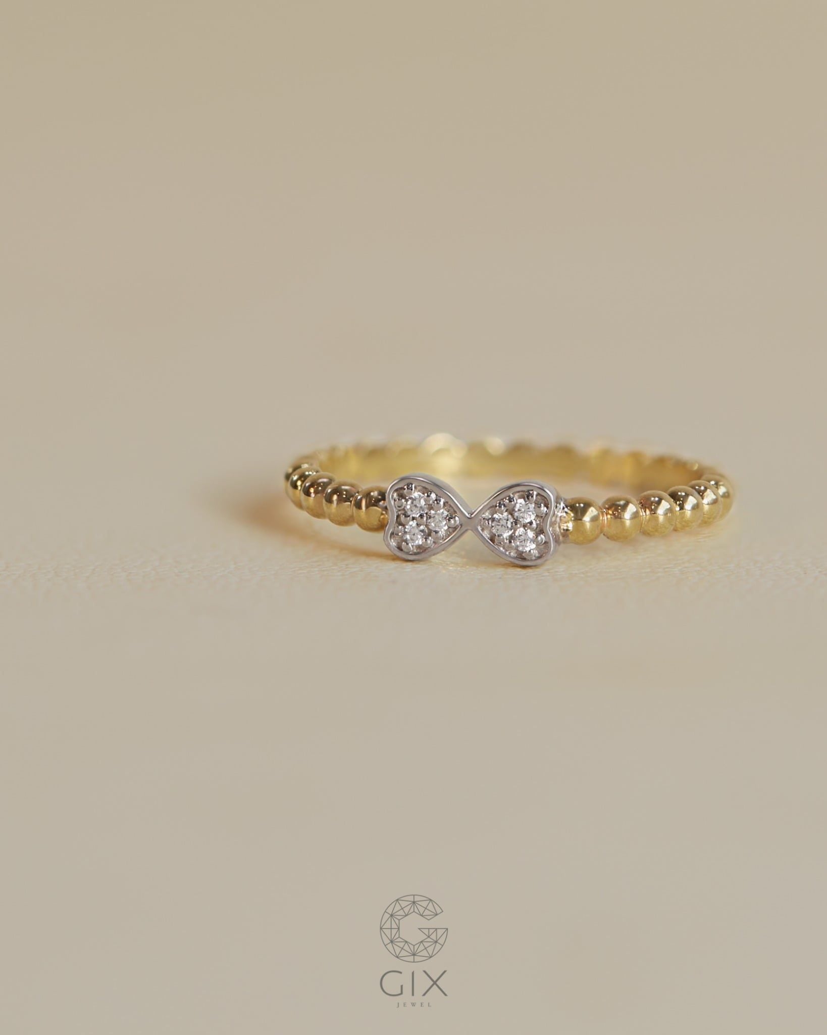  Nhẫn vàng 14K nữ đai bi tròn hình nơ xinh | Gix Jewel 