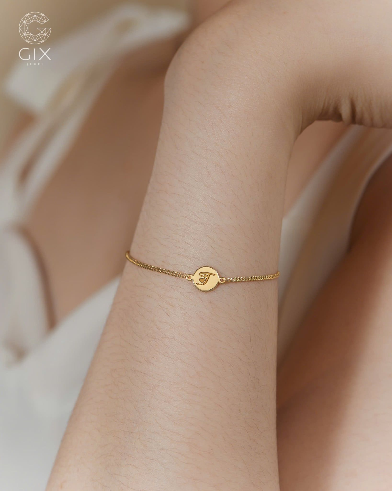 [CÓ SẴN] Lắc tay khoen lật vàng 14k mặt tròn khắc T - 16.5cm 