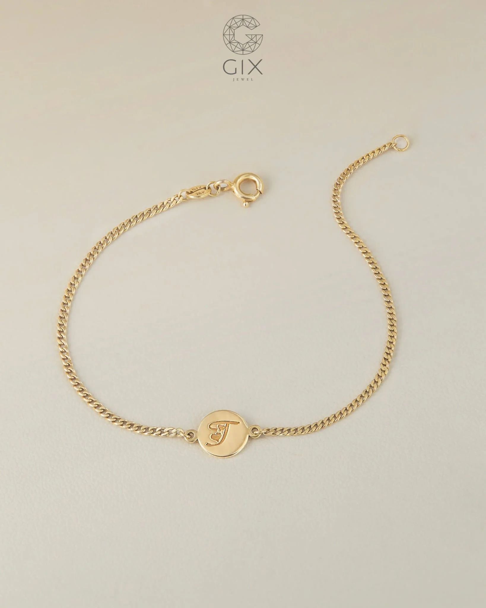  [CÓ SẴN] Lắc tay khoen lật vàng 14k mặt tròn khắc T - 16.5cm 