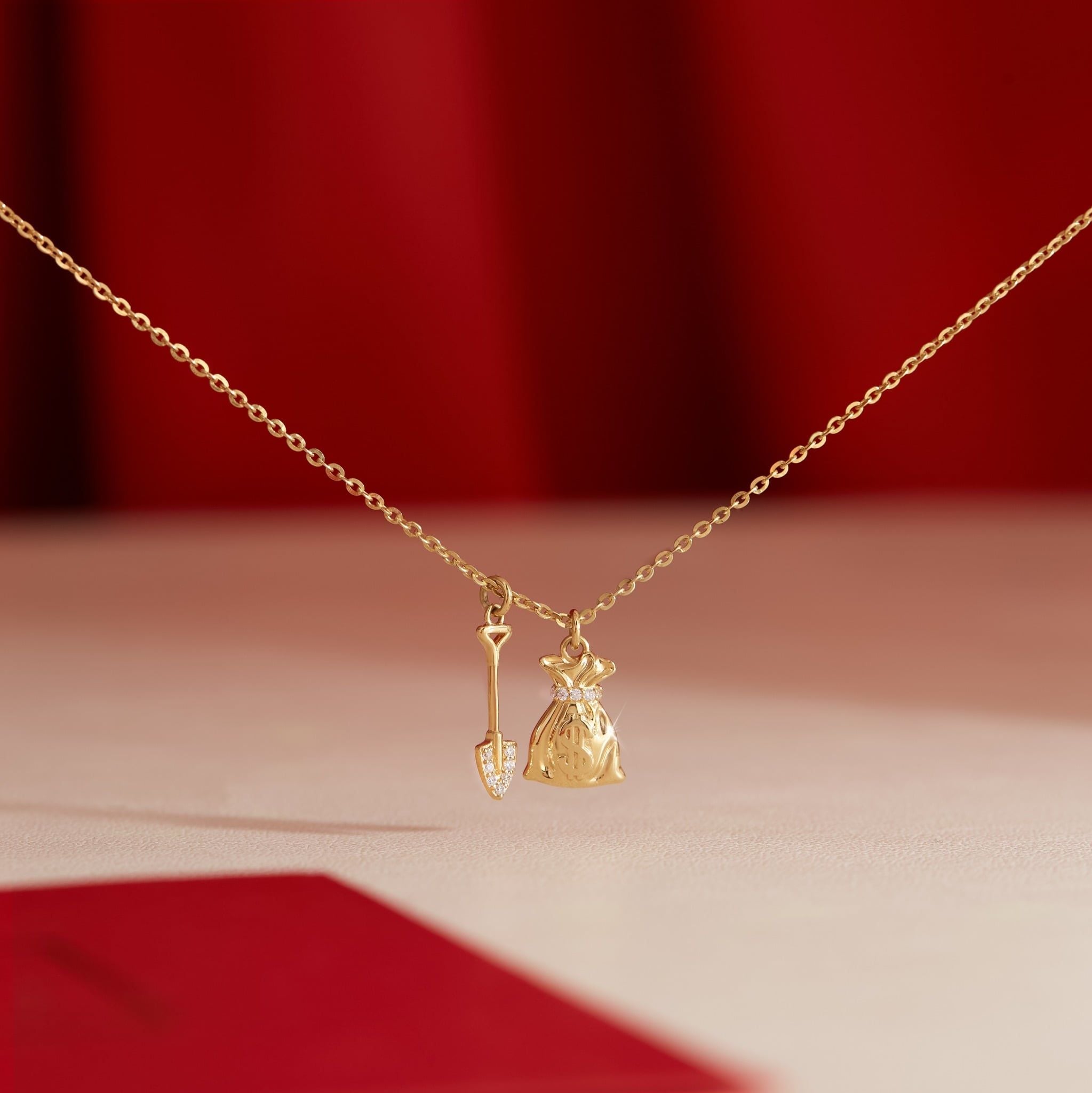  Dây chuyền vàng nữ đẹp hình túi thần tài diện tết 2026 | Gix Jewel 