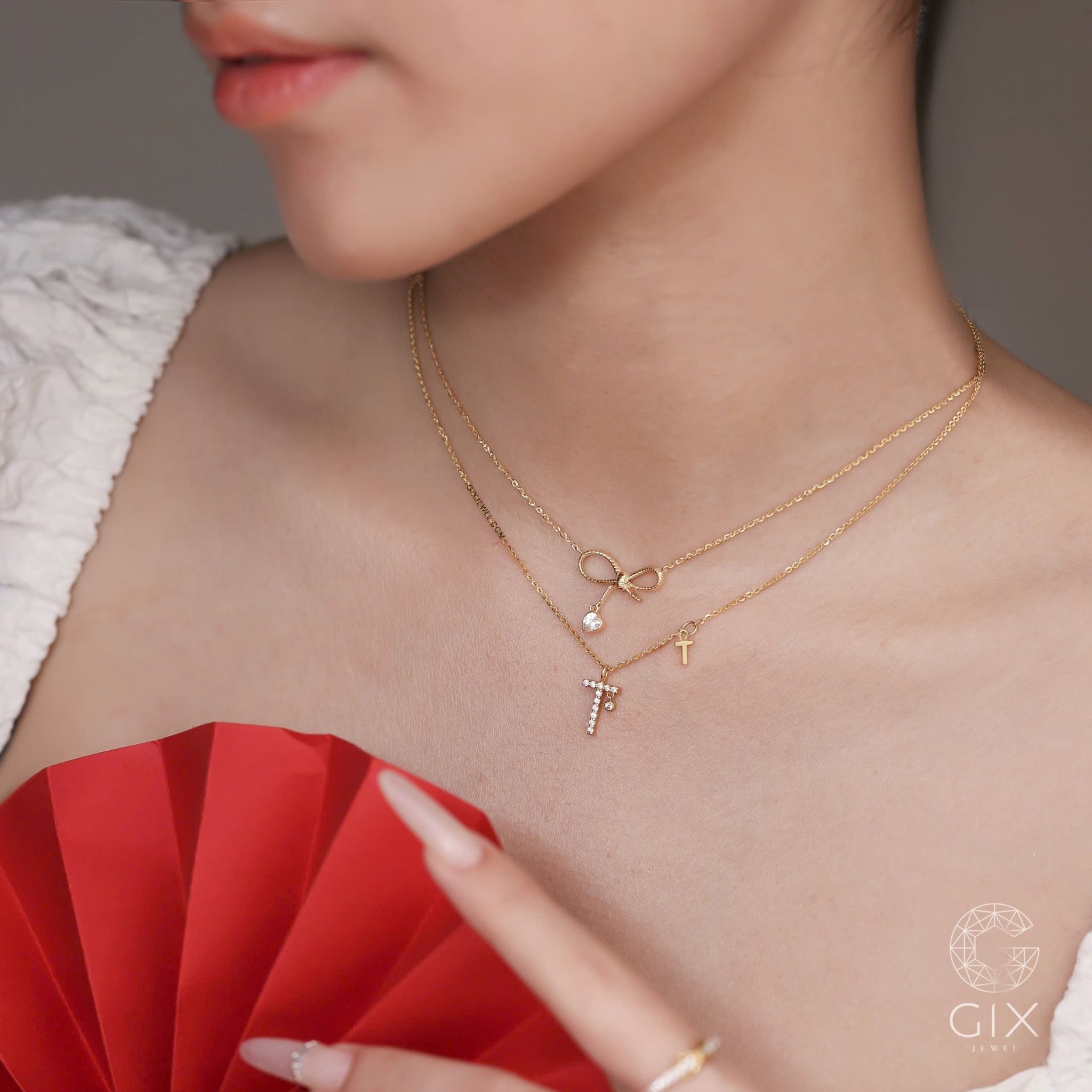  Dây chuyền vàng nữ đẹp vàng hồng 18k sợi chữ cong hình nơ xinh đính đá Gix 