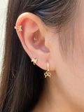  14K Sparkling Bow Mini Huggie 