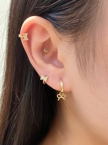  14K Sparkling Bow Mini Huggie 