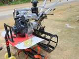 MÁY XỚI ĐẤT CHẠY DẦU HAI CẦU - 2 HỘP SỐ KA-190