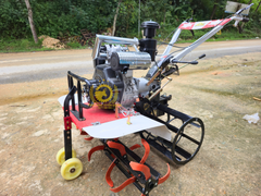 MÁY XỚI ĐẤT CHẠY DẦU HAI CẦU - 2 HỘP SỐ KA-190