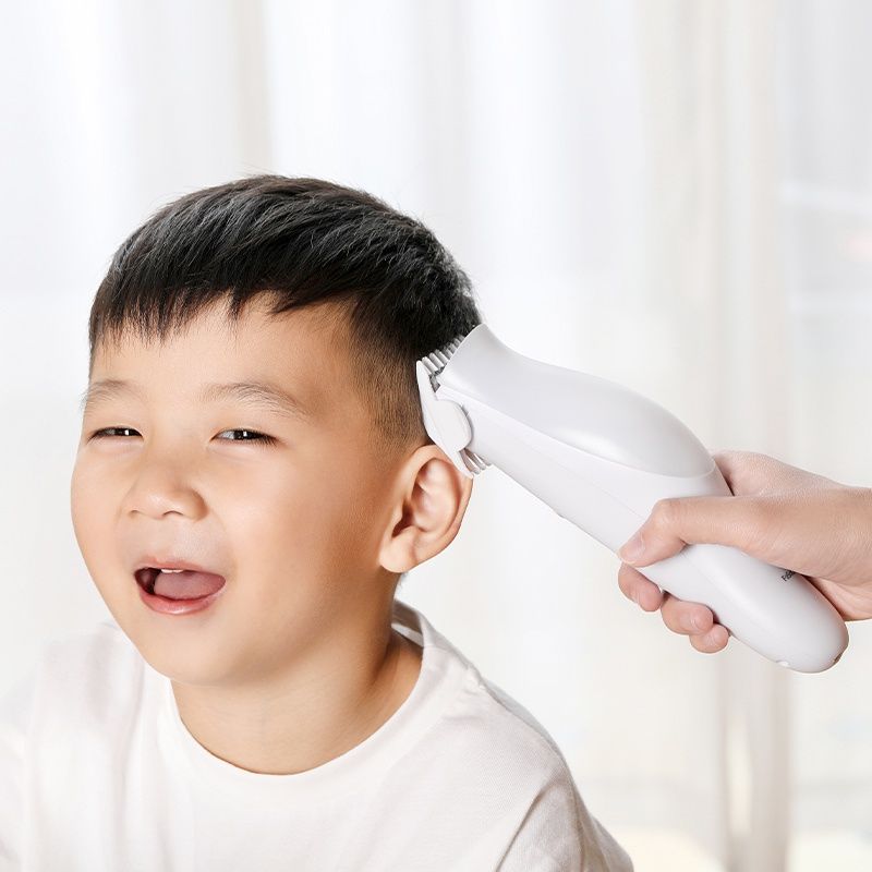 Tông đơ cắt tóc thông minh (hút tóc tự động)