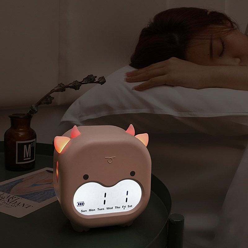 Đồng hồ báo thức hình bò ngố Dada hồng phấn FSLDZ-504