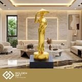 Tượng cô gái mặc áo dài Việt Nam mạ vàng