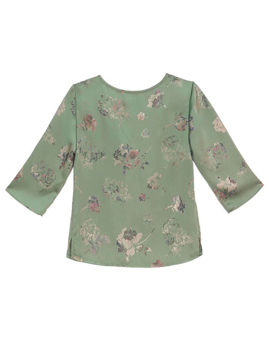  Hạnh Áo cổ tròn họa tiết hoa dập nổi, kết hạt, tay lửng 1432/5.187 