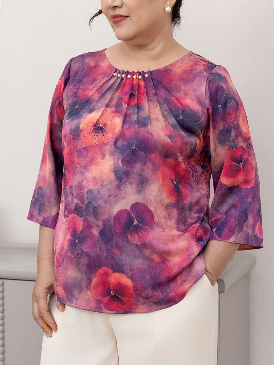  Hạnh Áo cổ tròn họa tiết hoa dập nổi, kết hạt, tay lửng 1432/5.295 