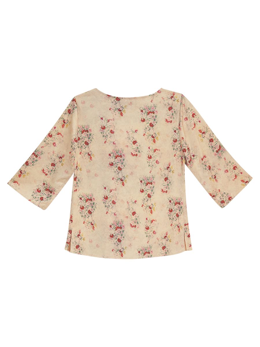  Hạnh Áo cổ tròn đính bi, họa tiết dập nổi, tay lửng 2486/5.191 