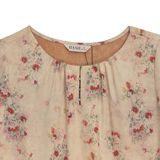  Hạnh Áo cổ tròn đính bi, họa tiết dập nổi, tay lửng 2486/5.191 