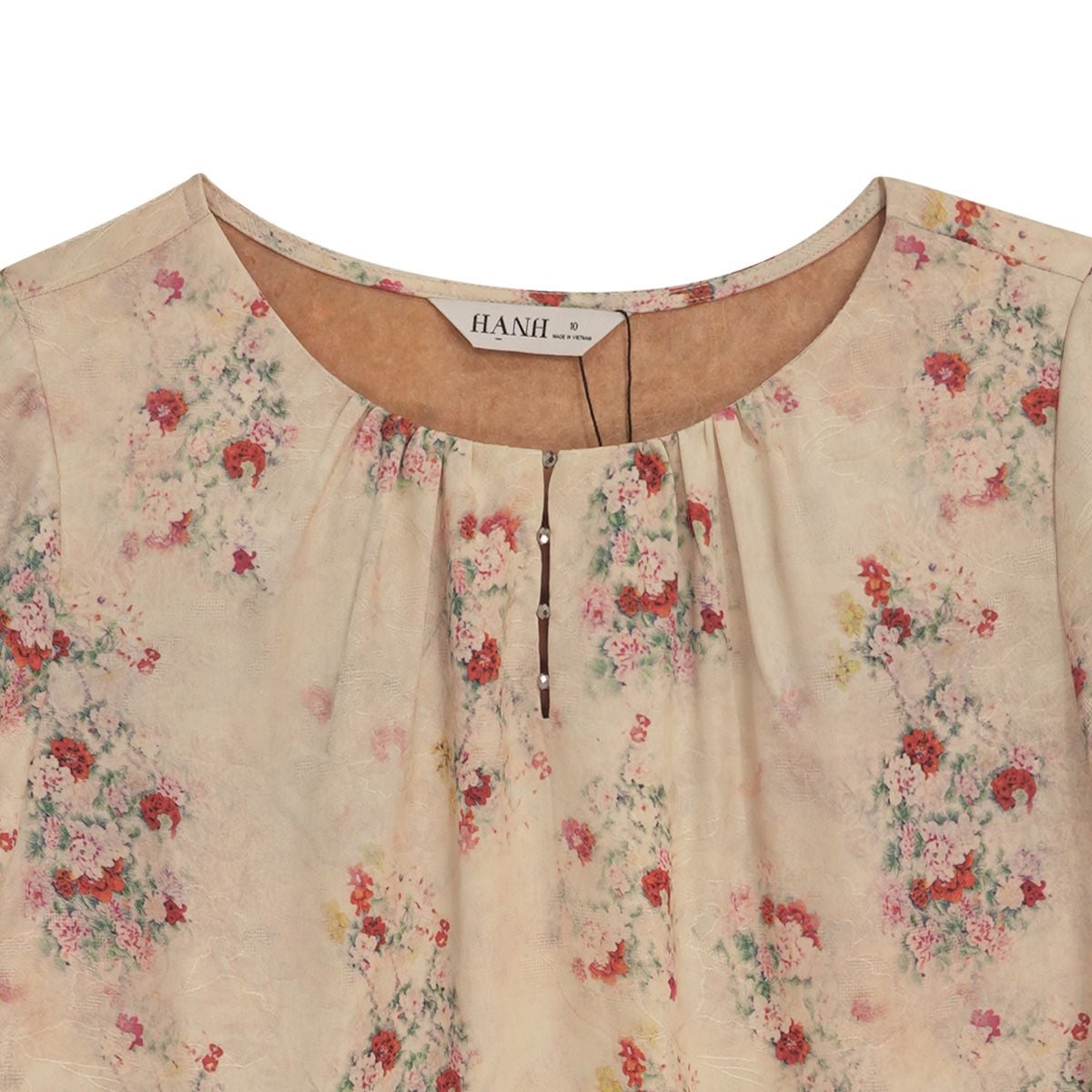  Hạnh Áo cổ tròn đính bi, họa tiết dập nổi, tay lửng 2486/5.191 