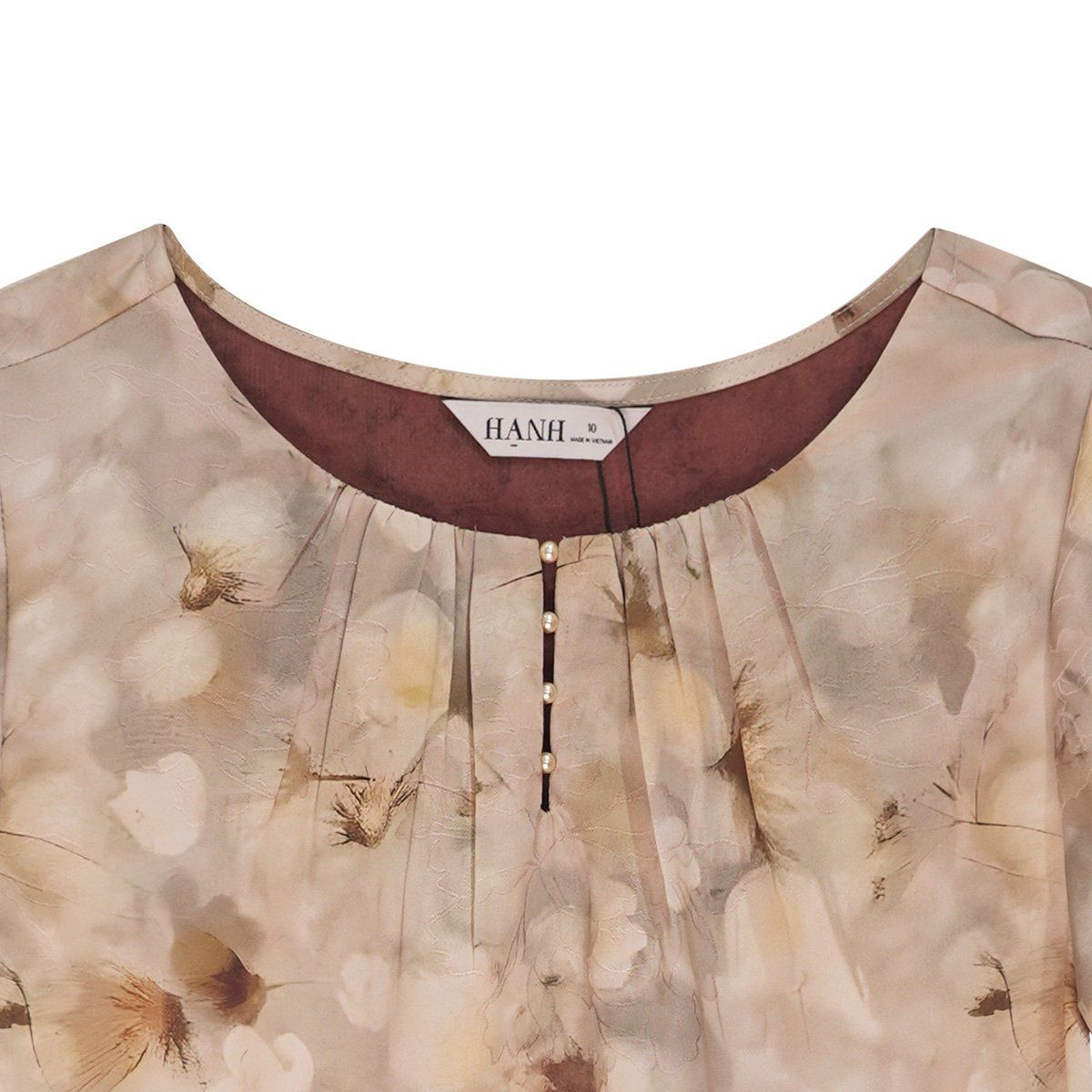  Hạnh - Áo cổ tròn đính bi, họa tiết dập nổi, tay lửng 2486/5.192 