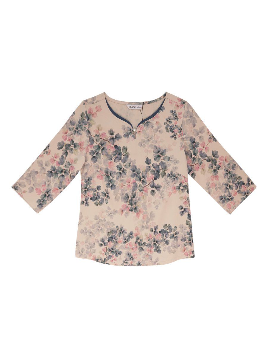  Hạnh Áo viền cổ xẻ lá trầu đính hạt châu, in họa tiết hoa lá, tay lửng 25415/5.257 