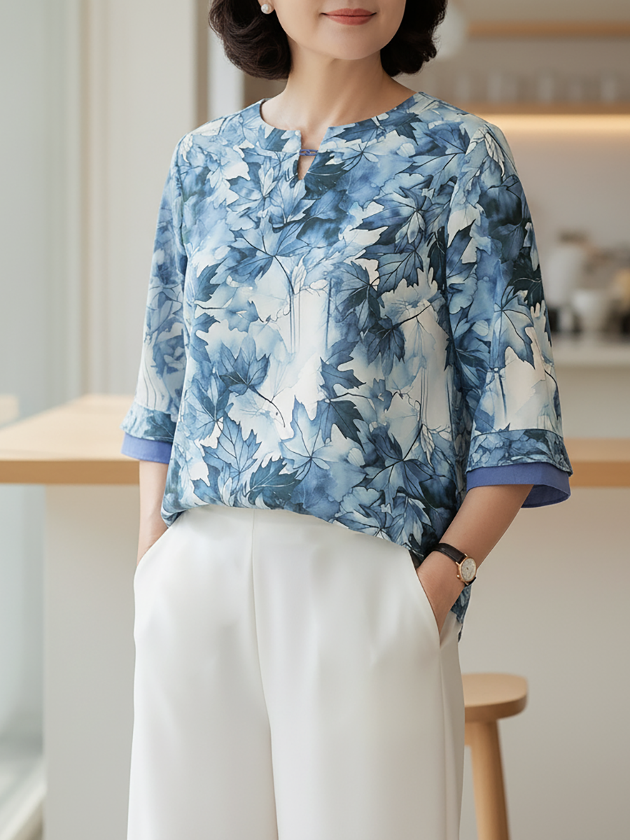  Hạnh - Áo kiểu cổ tròn xẻ cách điệu tay bèo lửng chất liệu lụa Canvan in họa tiết lá 4424/4.431 