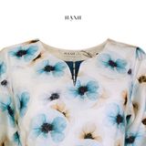  Hạnh áo cổ xẻ V viền kết hạt, vạt trước bo tròn, tay ngắn bèo cách điệu 