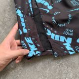  Quần Nike running gym Equip FV9616-015 chữ xanh 