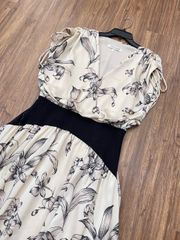 ĐẦM TAYLOR MAXI KEM HOA RÚT DÂY