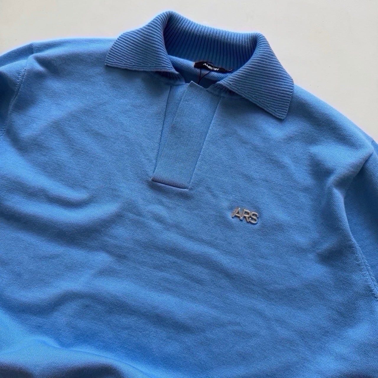 METAL LOGO KNIT POLO SHIRT - BLUE 