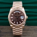 Đồng Hồ Rolex Day-Date 40mm 228235-0003 Rep 1:1 Cao Cấp Vỏ Vàng Hồng Mặt Nâu Cọc Số Đính Đá Baguette Dây Kim Loại