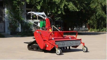 Máy cắt cỏ trục băm bánh xích Kawasaki KW186F