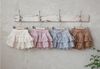 FL - SUM0226 - Quần váy Anna ren đục lỗ xếp tầng