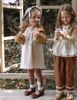 FL - AUT0326 Váy Cherry thun gấu ren tay kẻ