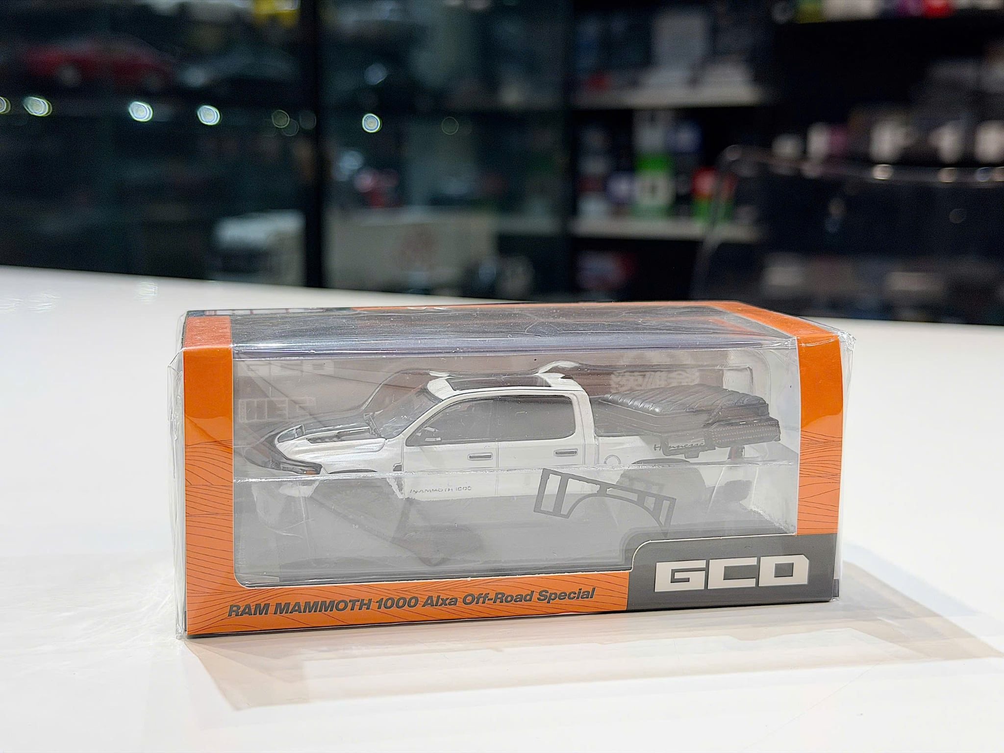 XE MÔ HÌNH HEC 2026 - RAM MAMMOTH 1000 ALXA OFF ROAD SPECIAL,TỶ LỆ 1/64 GCD