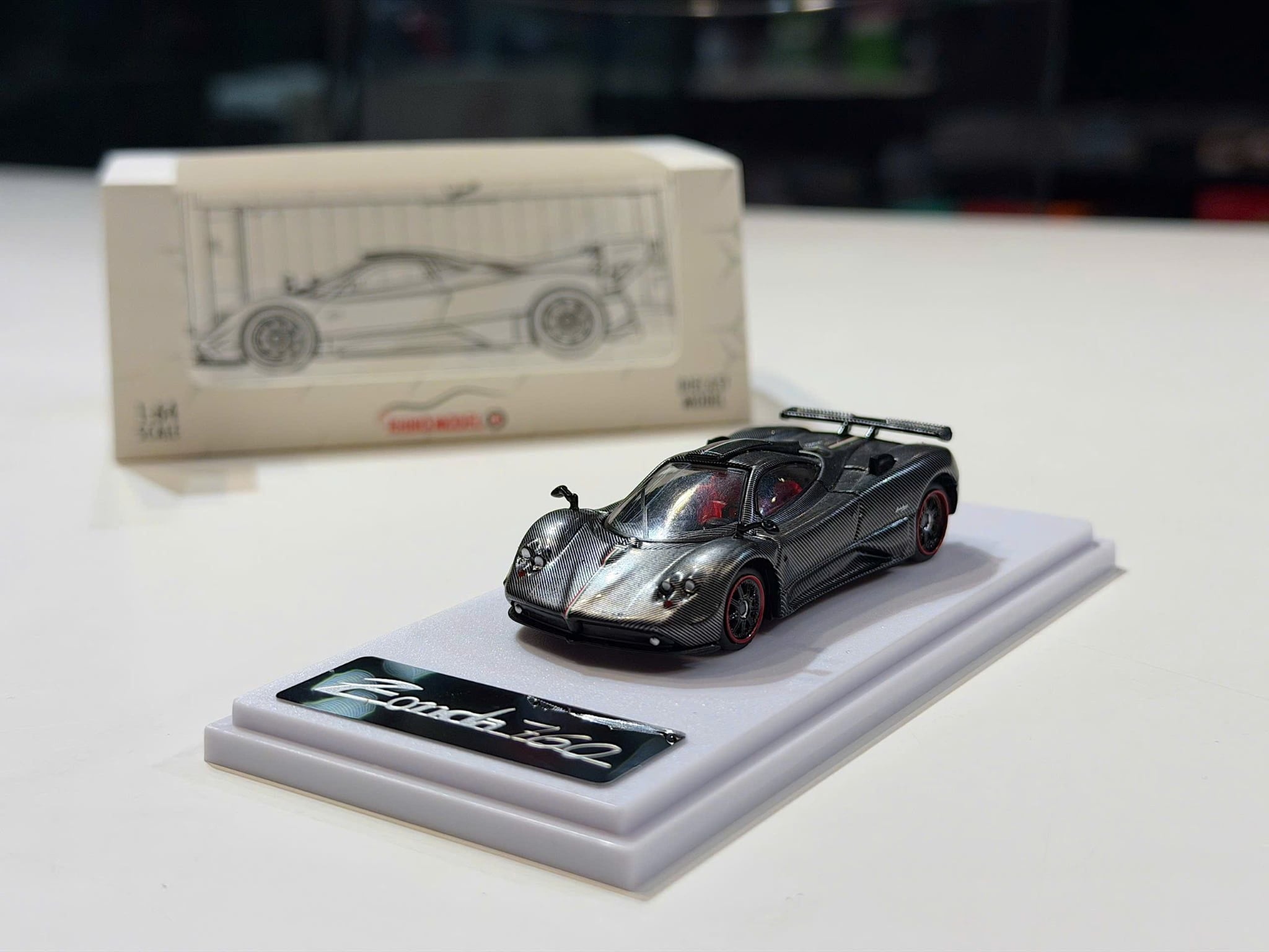 XE MÔ HÌNH PAGANI ZONDA 760 CARBON FIBER,TỶ LỆ 1/64 RHINO