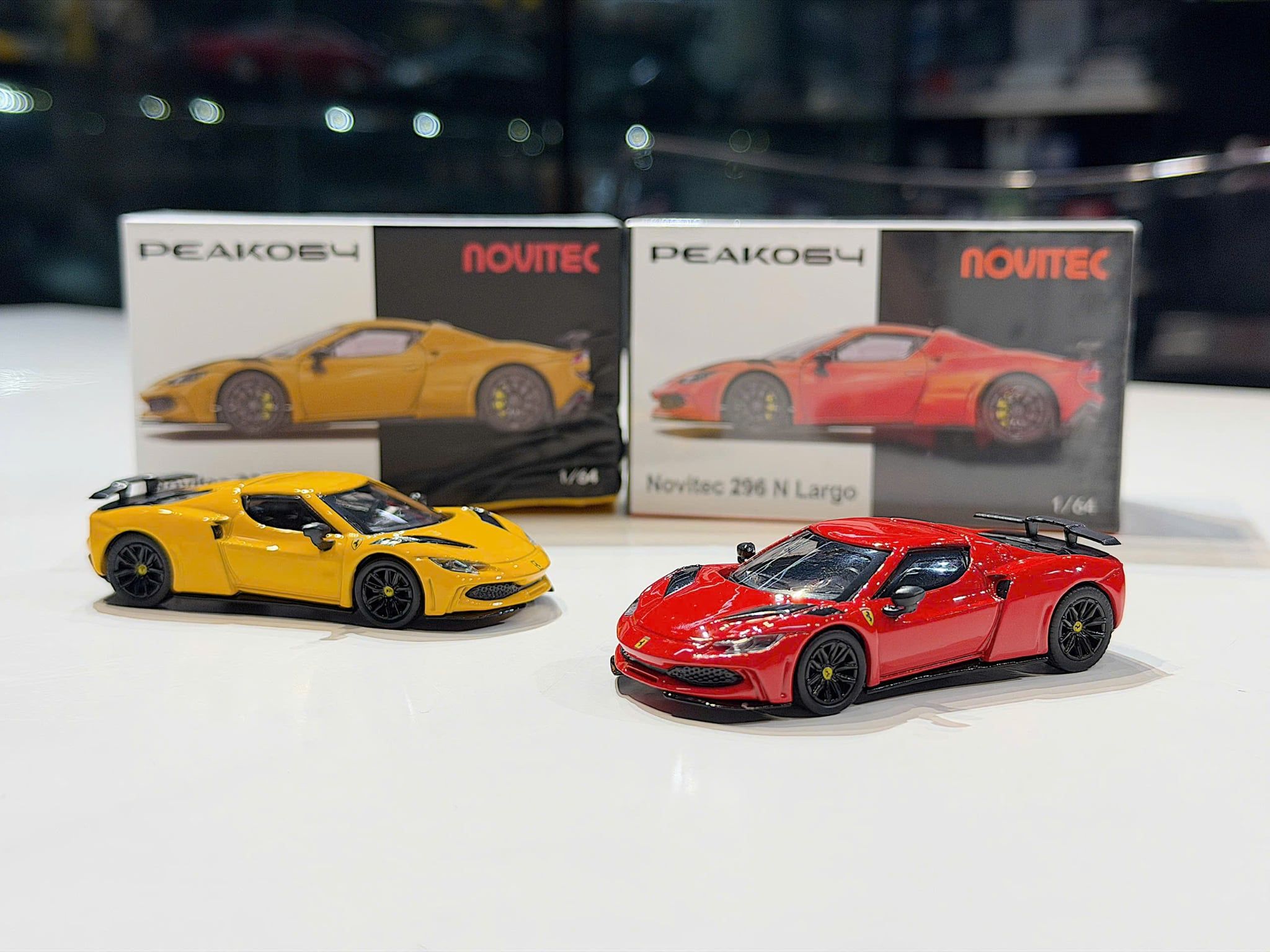 XE MÔ HÌNH FERRARI 296 N LARGO,TỶ LỆ 1/64 PEAKO64