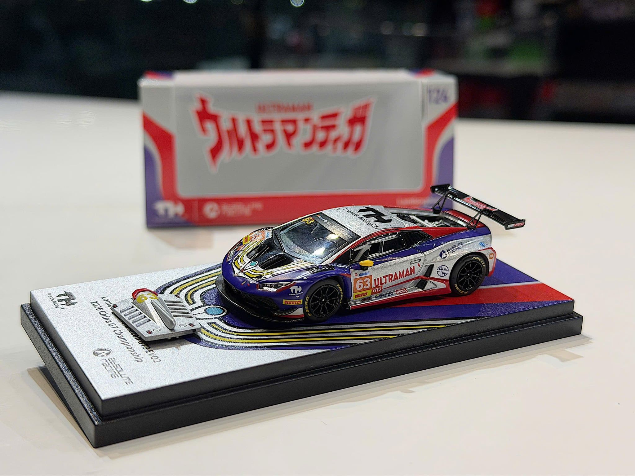 XE MÔ HÌNH LAMBORGHINI HURACAN GT3 EVO 2 ULTRAMAN,TỶ LỆ 1/64 TRENDS HOBBY