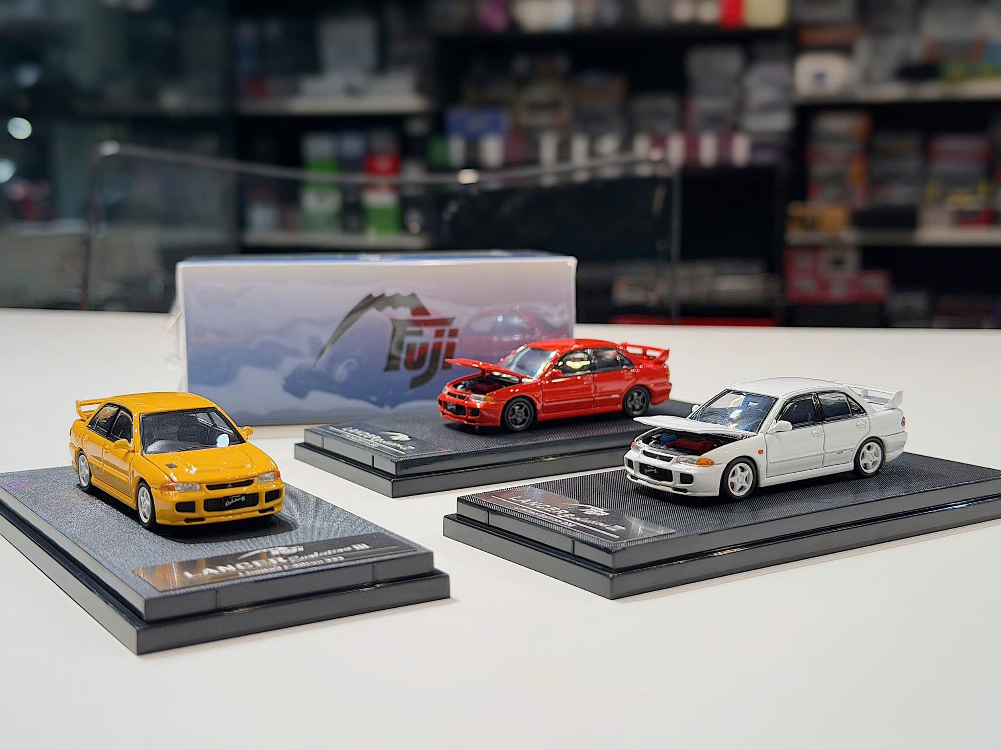 XE MÔ HÌNH MITSUBISHI LANCER EVO III GSR,TỶ LỆ 1/64 FUJI