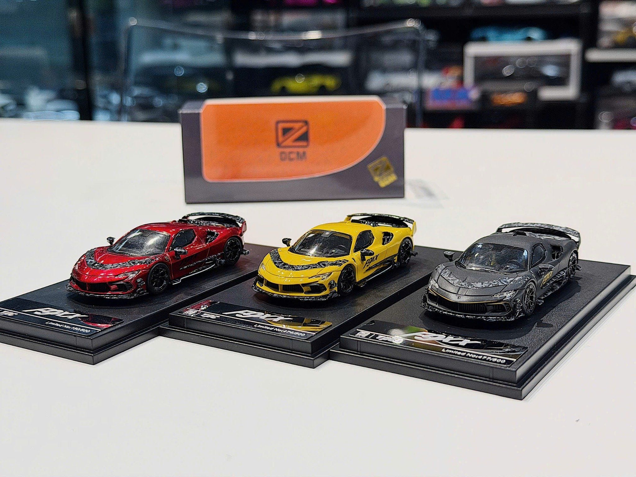 XE MÔ HÌNH FERRARI F9XX COUPE,TỶ LỆ 1/64 DCM