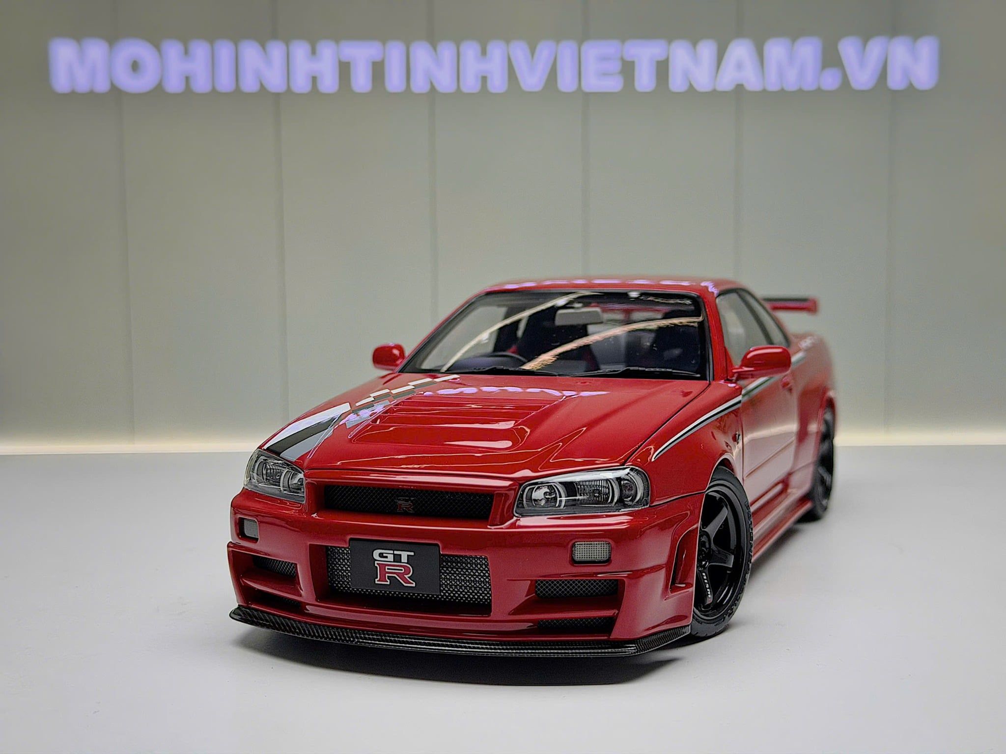 XE MÔ HÌNH NISSAN SKYLINE GT-R R34 CUSTOMIZEDRED,TỶ LỆ 1/18 MOTORHELIX