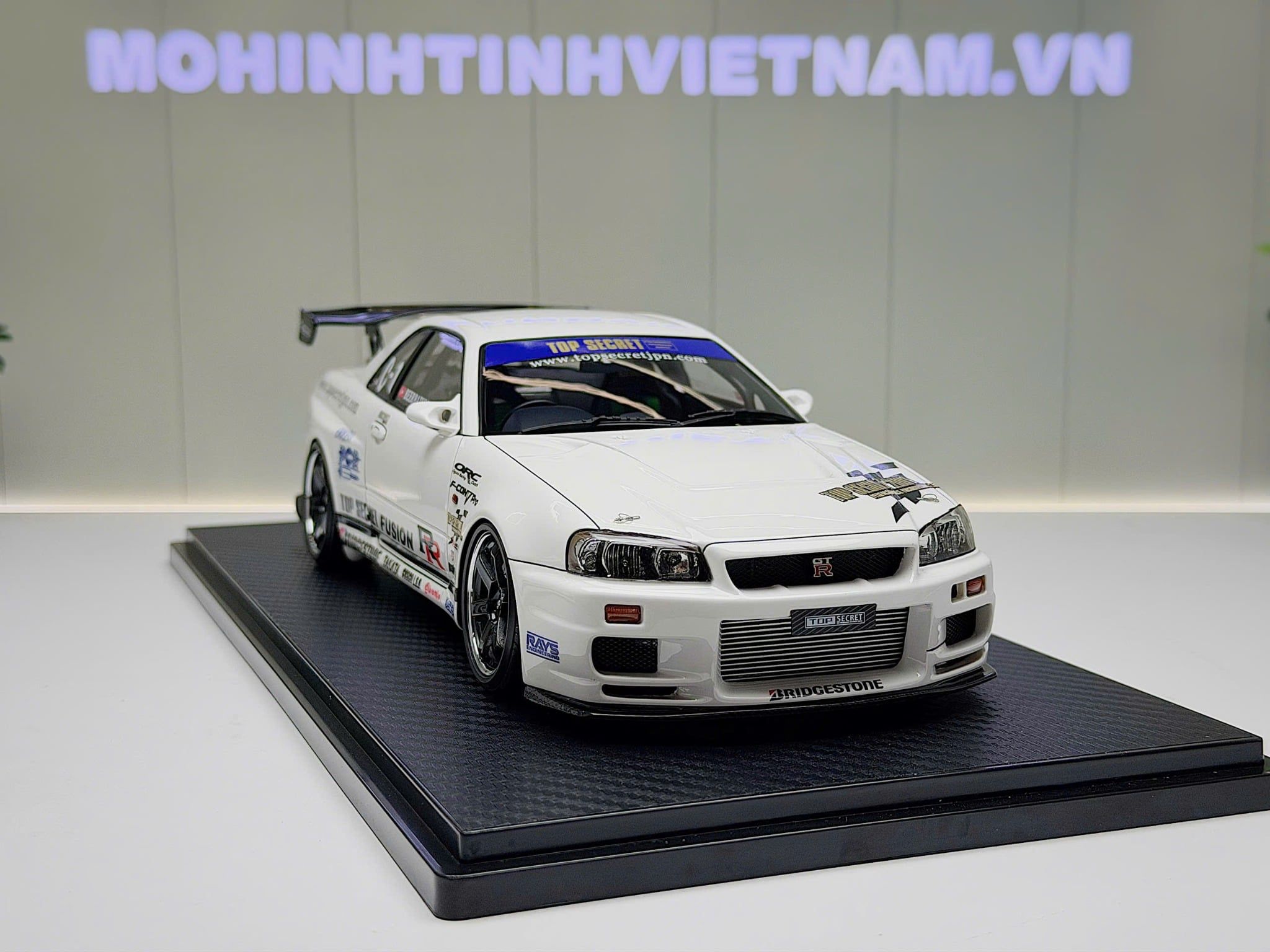 XE MÔ HÌNH NISSAN GT-R R34 TOP SECRET WHITE,TỶ LỆ 1/18 IGNITION