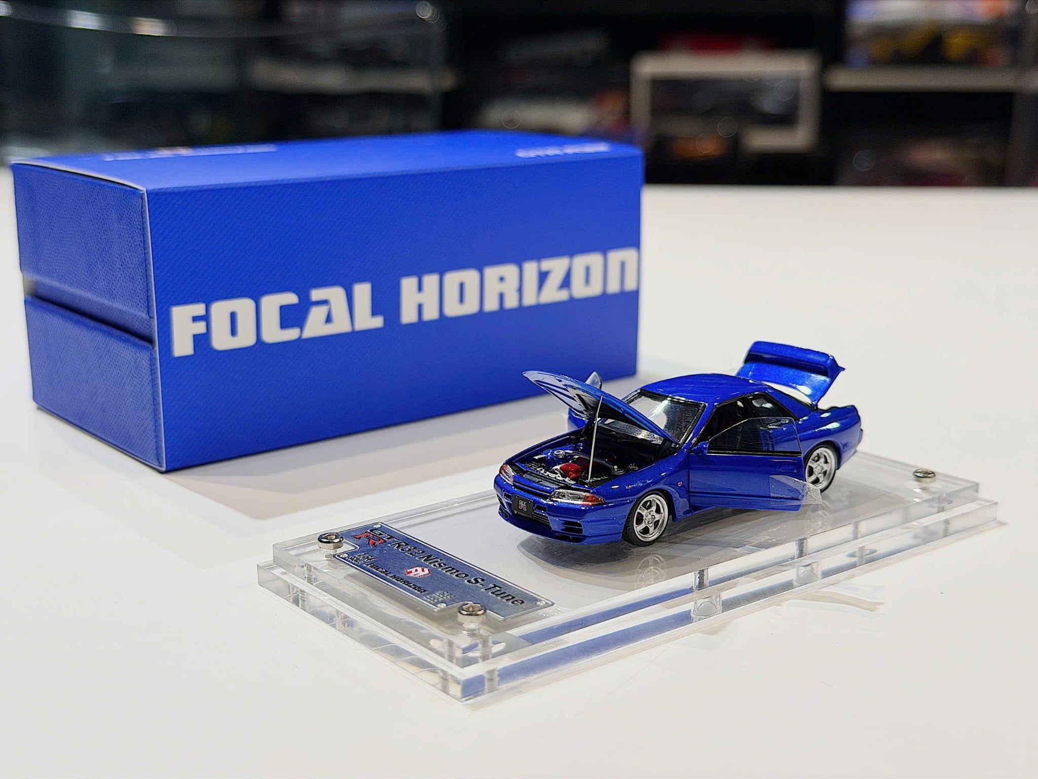 XE MÔ HÌNH NISSAN GT-R R32 NISMO S-TUNE BÁYIDE BLUE,TỶ LỆ 1/64 FOCAL HORIZON