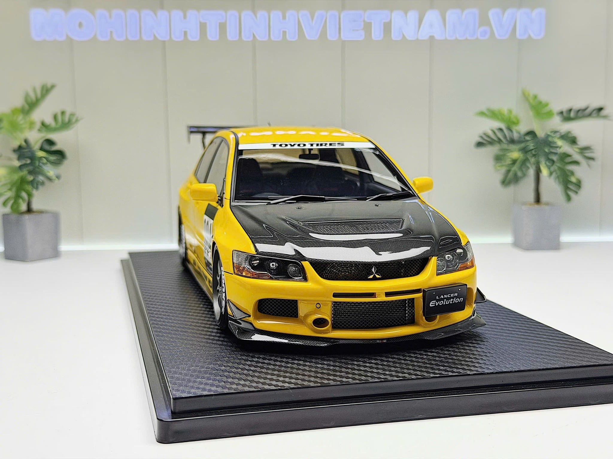 XE MÔ HÌNH MITSUBISHI LANCER EVOLUTION IX (CT9A) YELLOW,TỶ LỆ 1/18 IGNITION